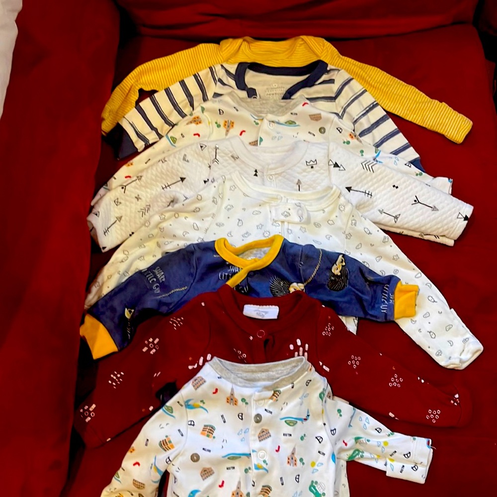 8 newborn onesies :) all is perfect condition